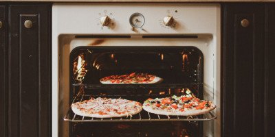 How long should a pizza be in the oven?