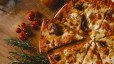 Welke kazen zitten er op een pizza quattro formaggi?